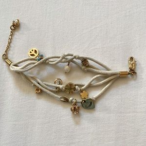 Juicy Couture Gold and Cream Charm Bracelet
